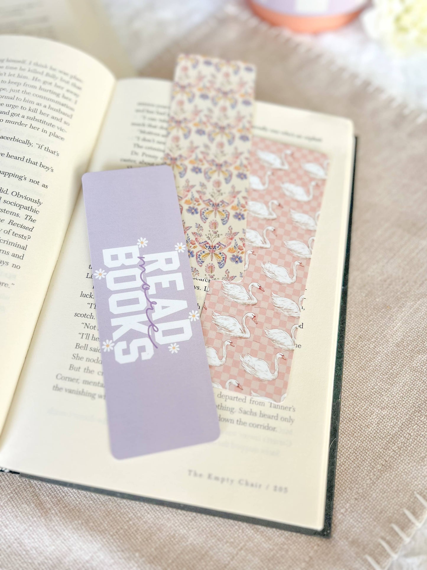 Swans, butterfly and read books Bookmarks