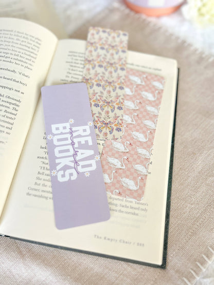 Swans, butterfly and read books Bookmarks